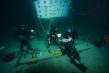 Tournage de film sous-marin avec travelling